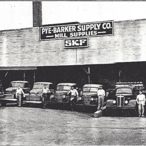 original pye barker building with truck fleet from 1940s