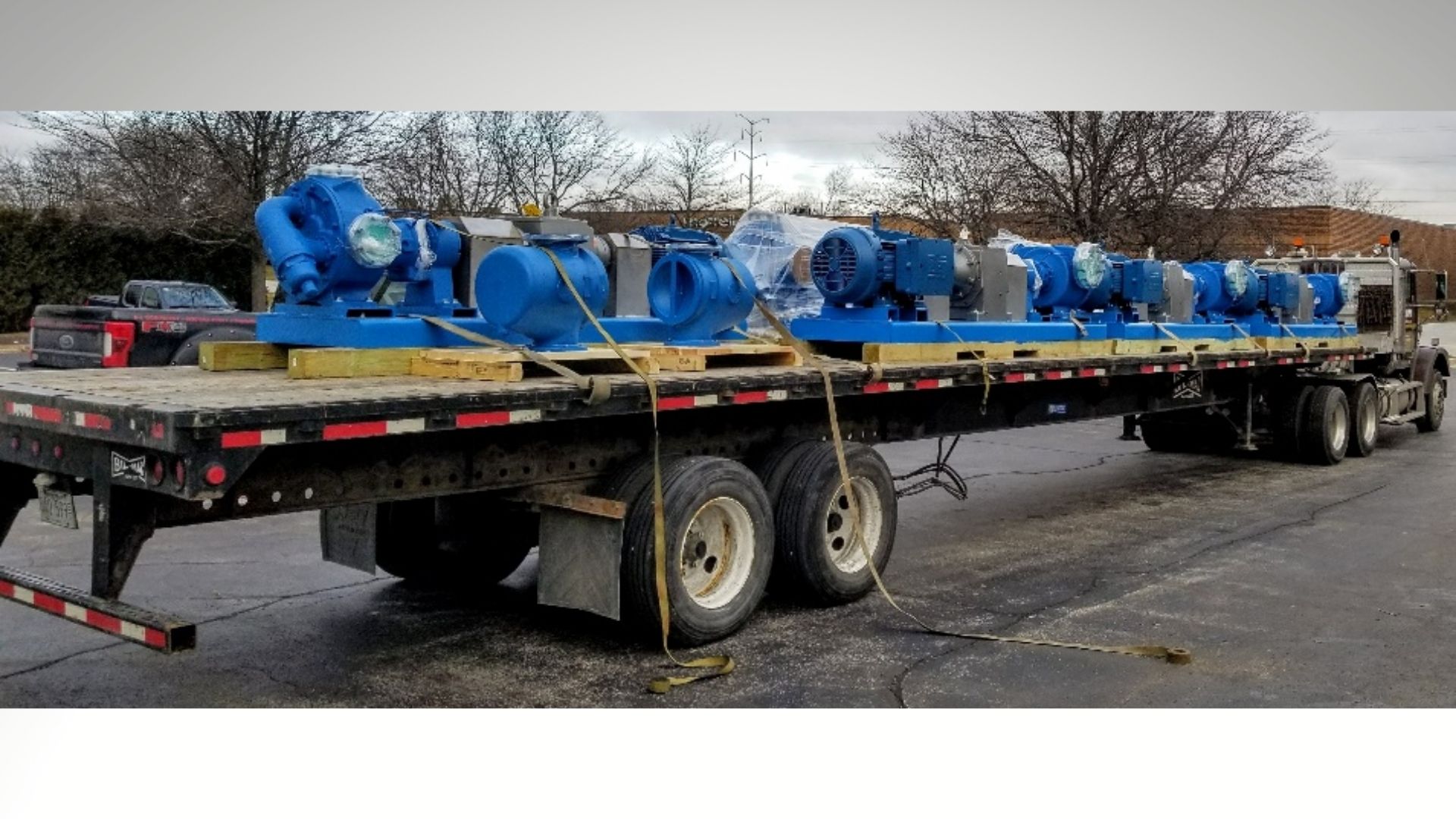 Asphalt pumps on back of semi