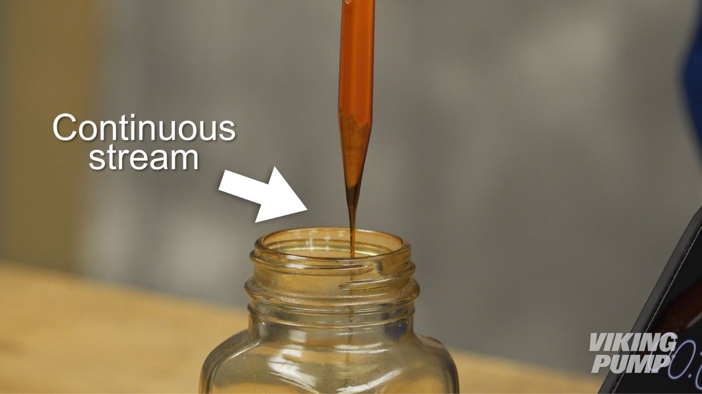 STEP 2: Submerge the pencil in the liquid, sharpened end first, up to this line.