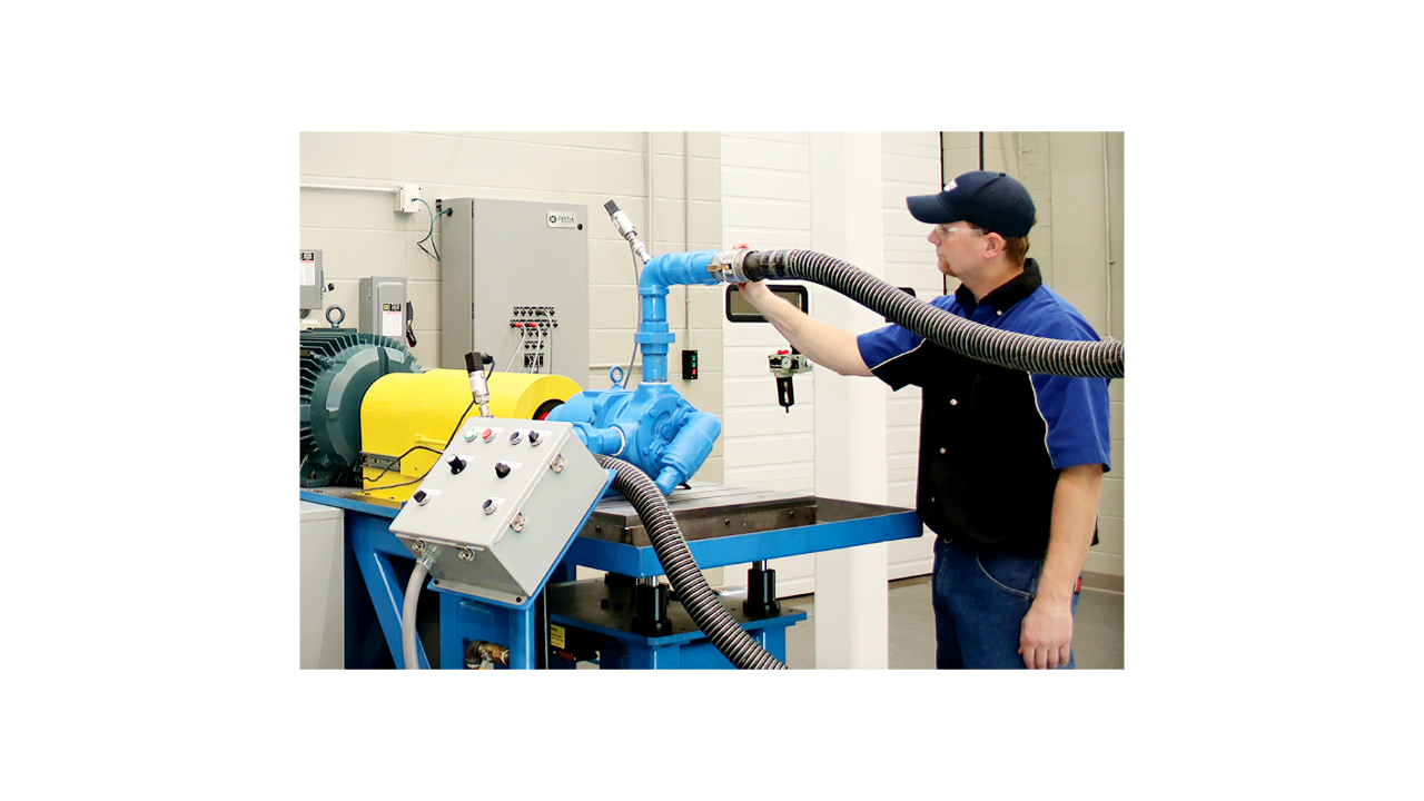 Viking employee running a test on a pump