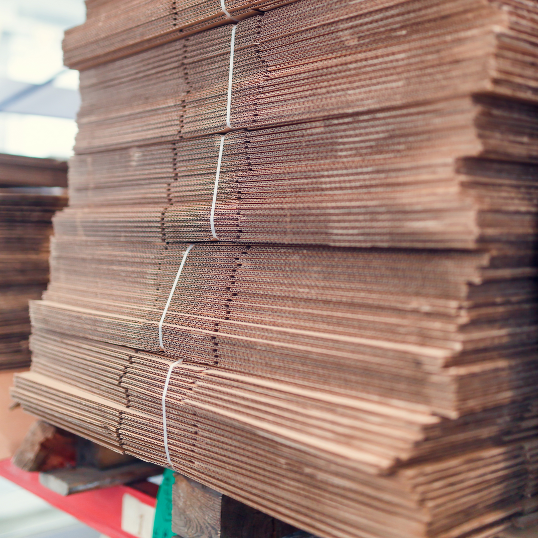 pallet of stacked flat cardboard boxes