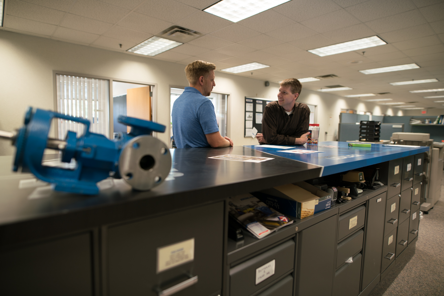 photo of two viking pump employees having a discussion
