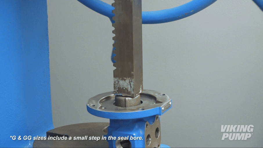 Animation showing the pressing of a lip seal into a gear pump.