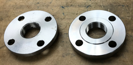 Figure 2 – ASME Stainless Steel Companion Flanges: Flat Face (left) and Raised Face (right)