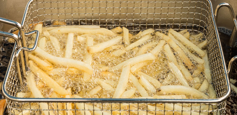 Fries frying in oil