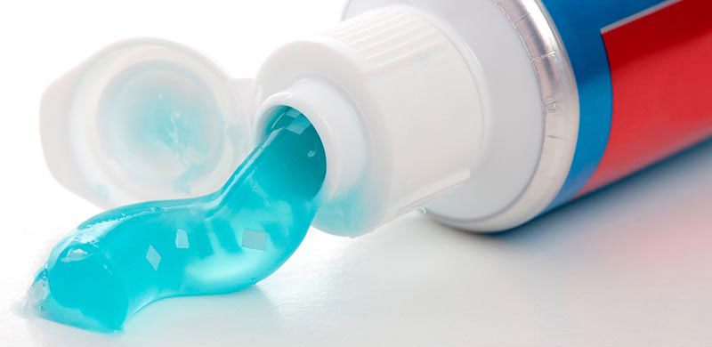 Toothpaste squeezed out of bottle