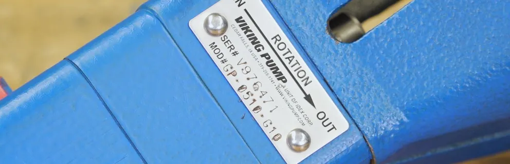 Pump tag showing direction of flow