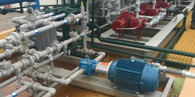motor driven glycol pump next to natural gas driven pumps
