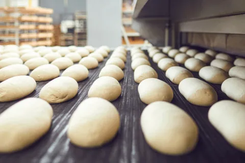 One point perspective grid of raw dough on a baking sheet