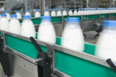 Assembly line of plastic 1 liter milk bottles