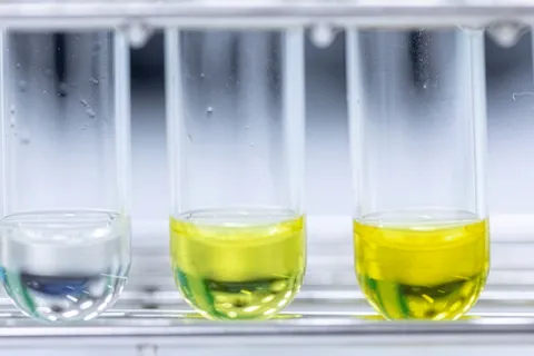 Test tubes with green solution