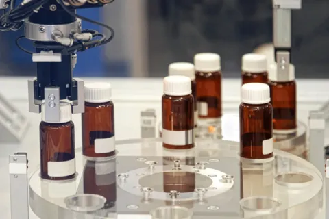 Amber colored glass pharmaceutical bottles in a lab