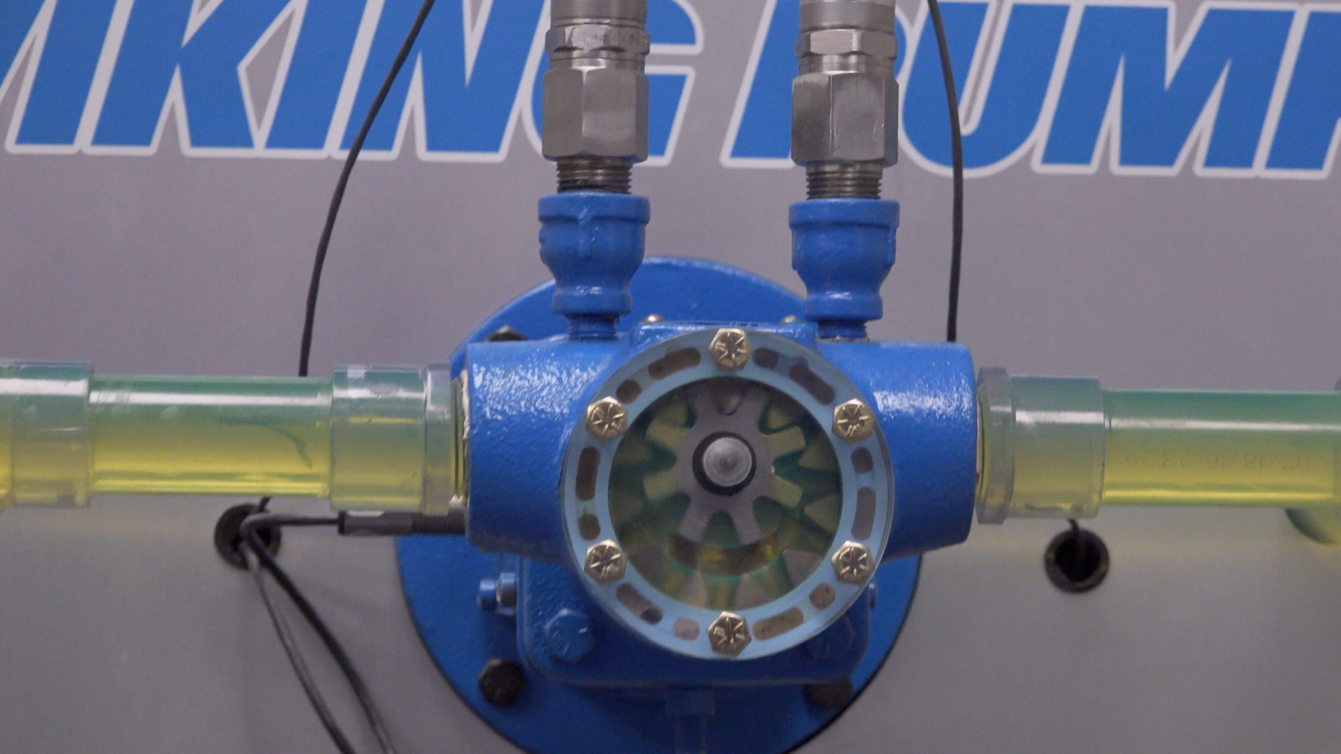 a pump with electronic gauges measuring inlet pressure and outlet pressure
