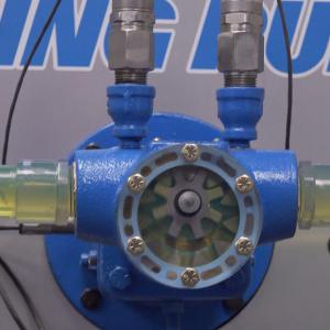 a pump with electronic pressure gauges at inlet and outlet ports